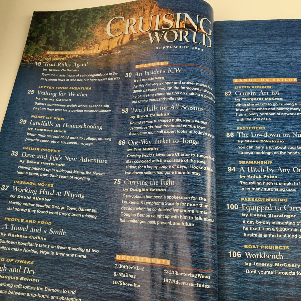 Table of contents from Cruising World Magazine September 2004, showcasing articles related to sailing and catamarans, including topics like 'Two Hulls for All Seasons' and 'Cruising Art 101'.