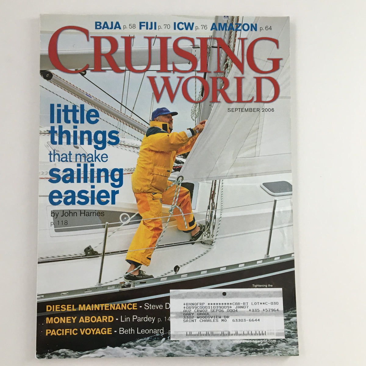 Cover of Cruising World Magazine September 2006 featuring 'Little Things That Make Sailing Easier' with a sailor in yellow gear on a sailboat.