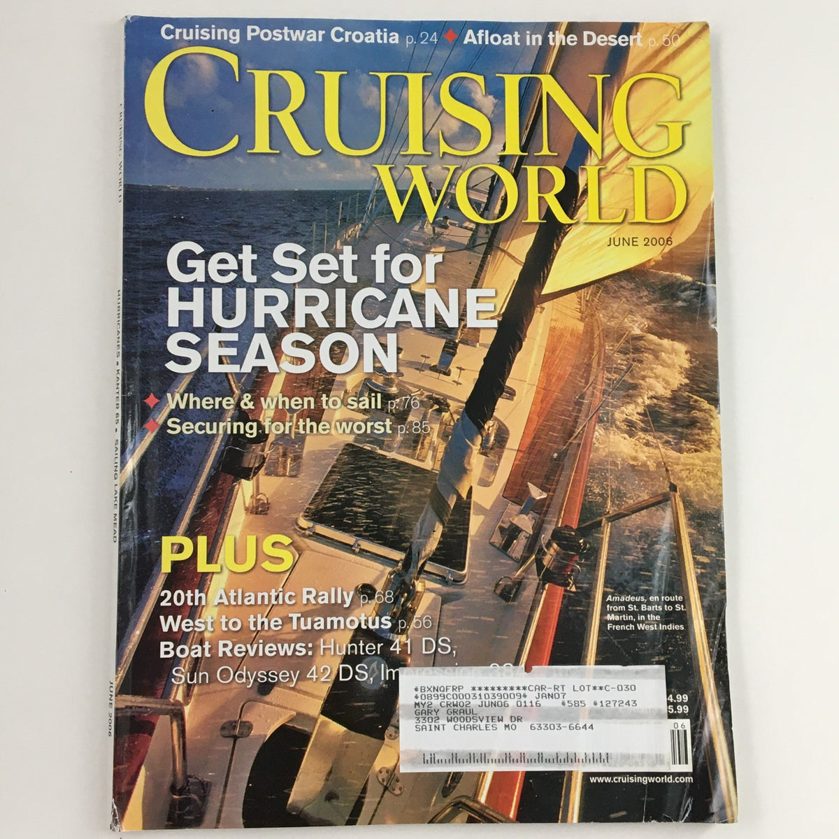 Cover of Cruising World Magazine June 2006 featuring a sailing boat and the headline 'Get Set for Hurricane Season', highlighting sailing tips and articles including '20th Atlantic Rally' and 'Boat Reviews'. This issue includes Amadeus En Route from St. Barts to St. Martin.