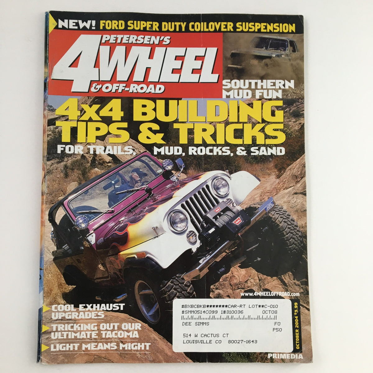 Petersen's 4 Wheel & Off-Road Magazine October 2004 cover featuring 4x4 building tips and tricks for off-road enthusiasts, showcasing a brightly colored Jeep on rugged terrain.