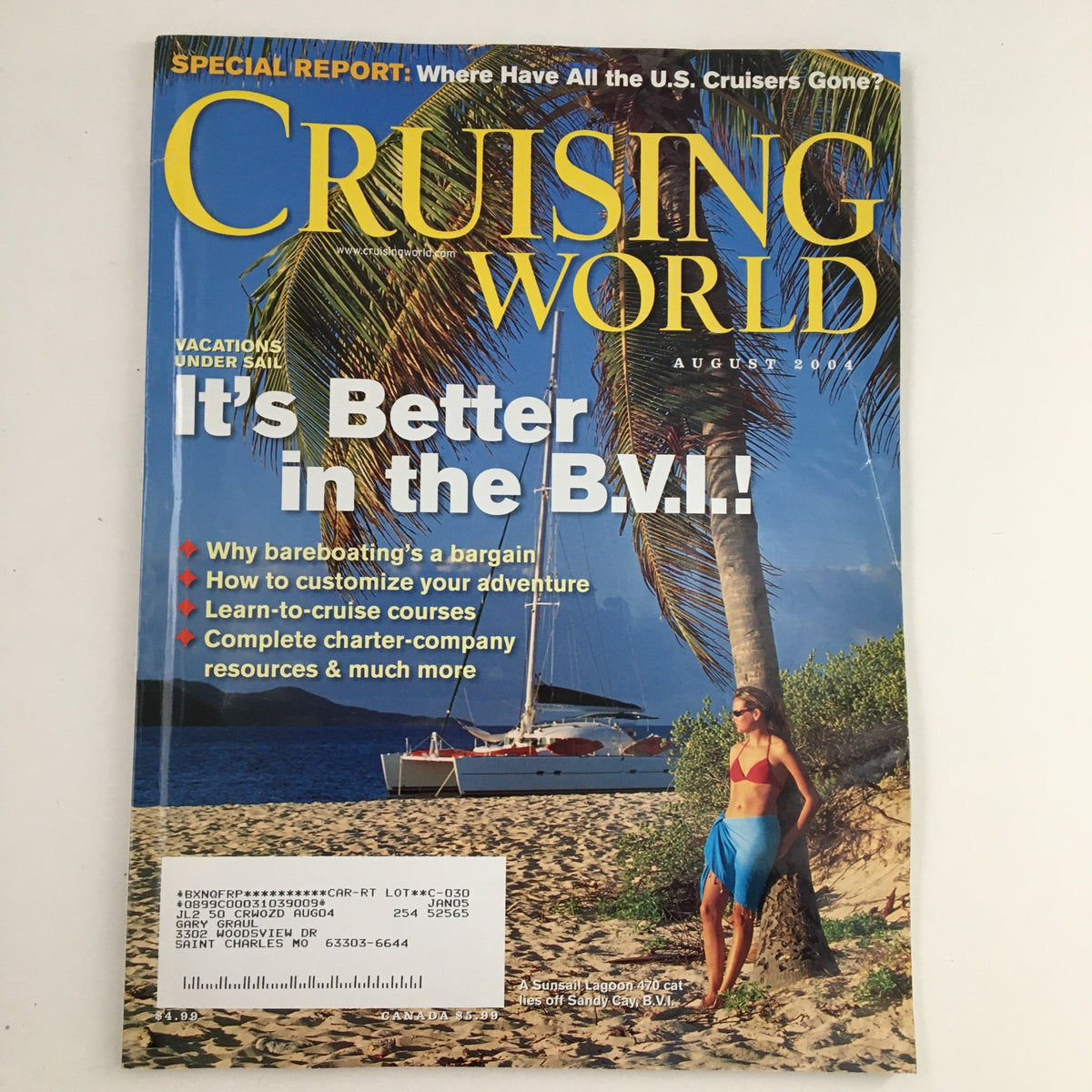Cover of Cruising World Magazine, August 2004, featuring a stunning Sunsail Lagoon 470 Catamaran off Sandy Cay, showcasing the allure of Caribbean sailing and vintage magazine collectibility.