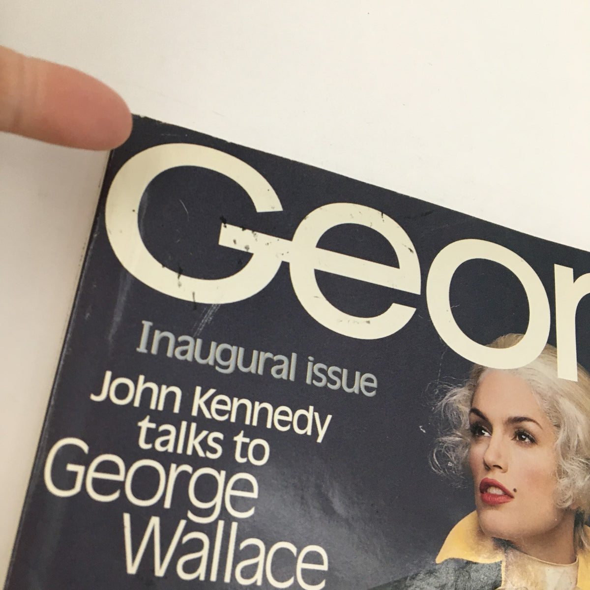 Inaugural cover of George Magazine October 1995 showcasing John Kennedy talking to George Wallace, with a focus on 90s celebrity culture.