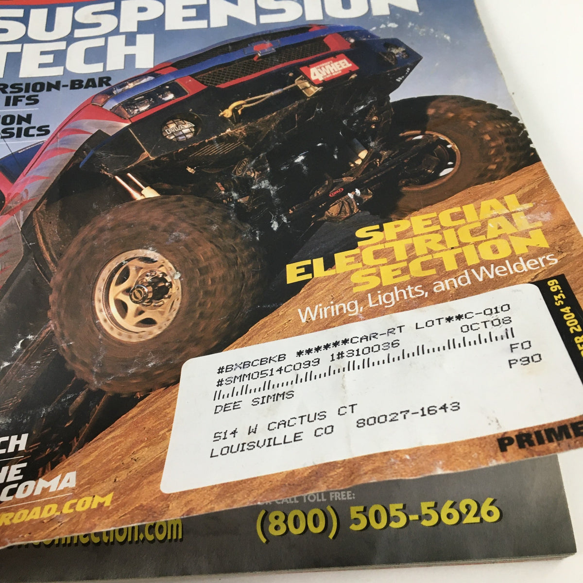 Close-up of Petersen's 4 Wheel & Off-Road Magazine September 2004 cover highlighting the Special Electrical Section, featuring an address label and details on suspension technology.