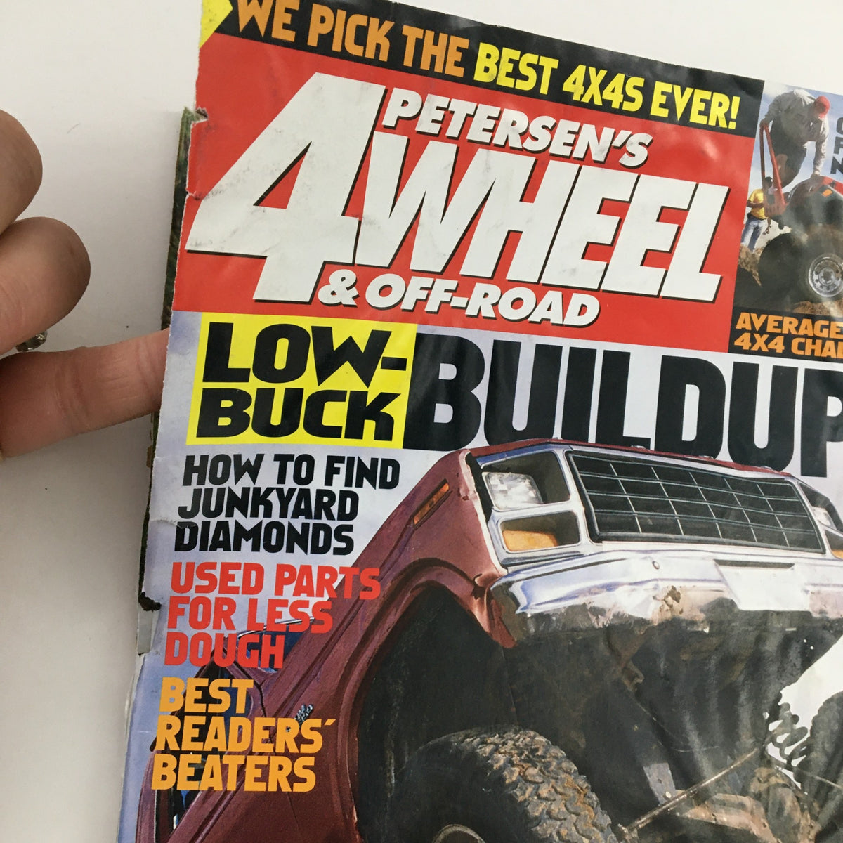 Close-up of the cover of Petersen's 4 Wheel & Off-Road Magazine June 2006, highlighting 'Low-Buck Buildups' and articles on finding junkyard parts for off-road modifications.