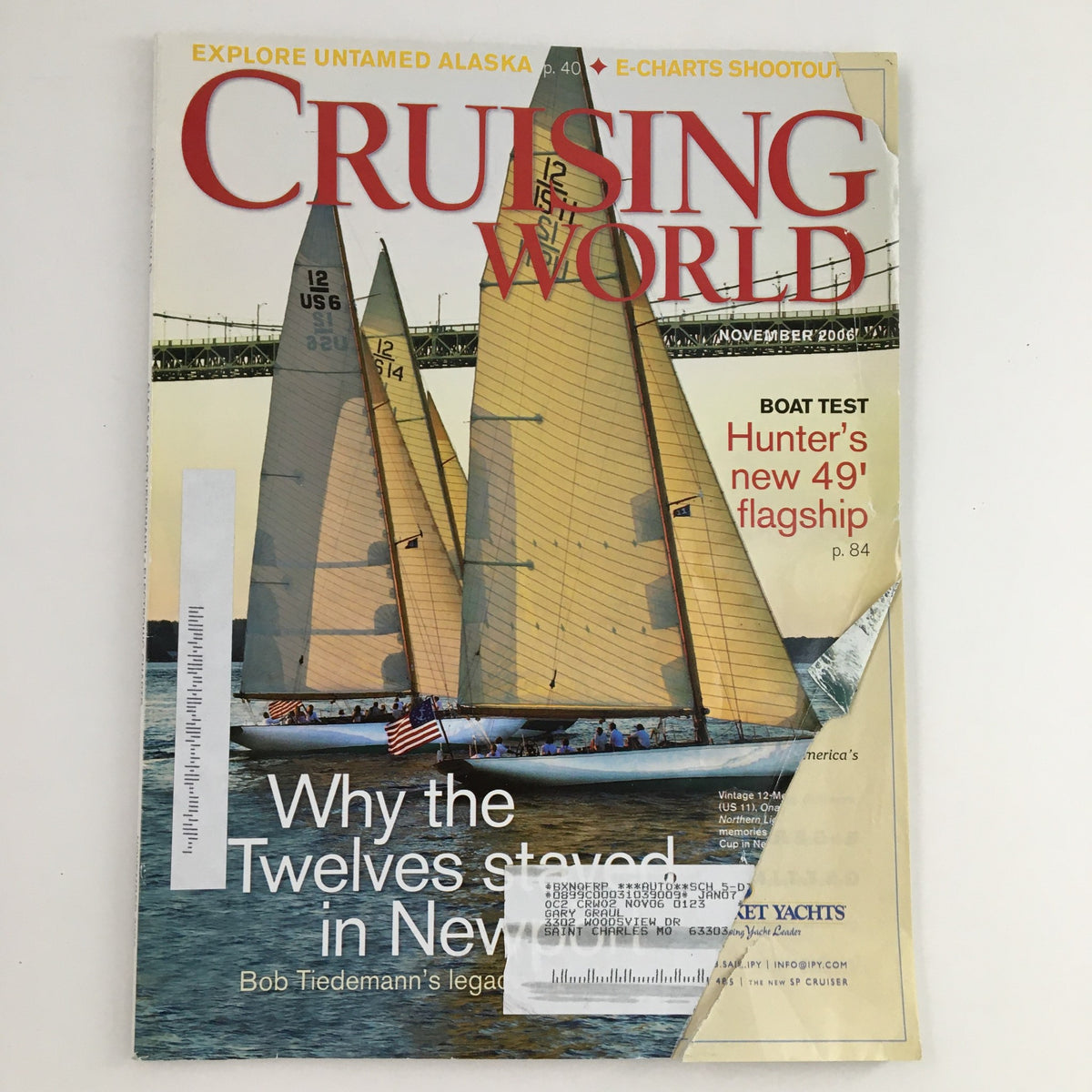 Cover of Cruising World Magazine November 2006 featuring sailboats, with visible wear and damage, showcasing the article 'The Merry Wives of the Windwards'.