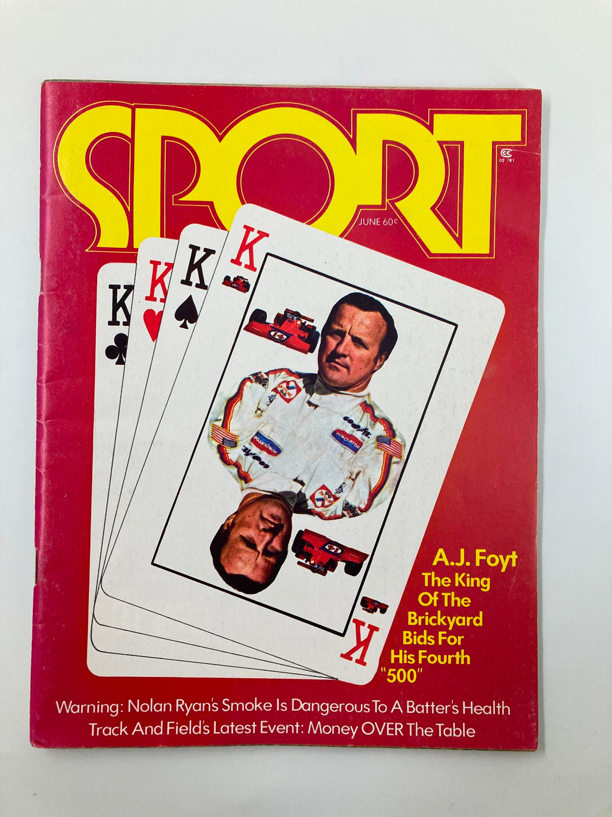 Cover of VTG Sport Magazine June 1973 Vol 55 #6 featuring A.J. Foyt, King of the Brickyard, alongside playing cards. The magazine showcases Foyt's significance in motorsports.
