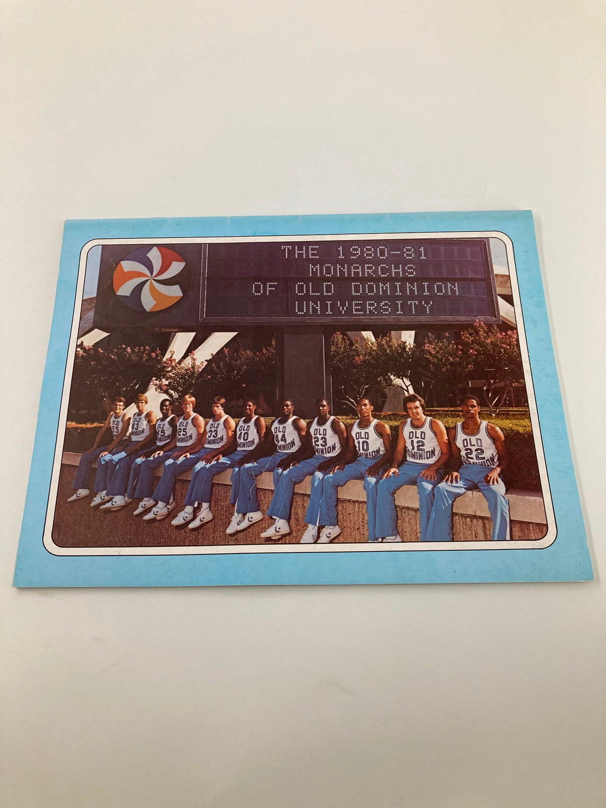 VTG 1980-1981 Monarchs of Old Dominion University Program cover featuring the team lineup with players seated in basketball uniforms, showcasing the university logo.