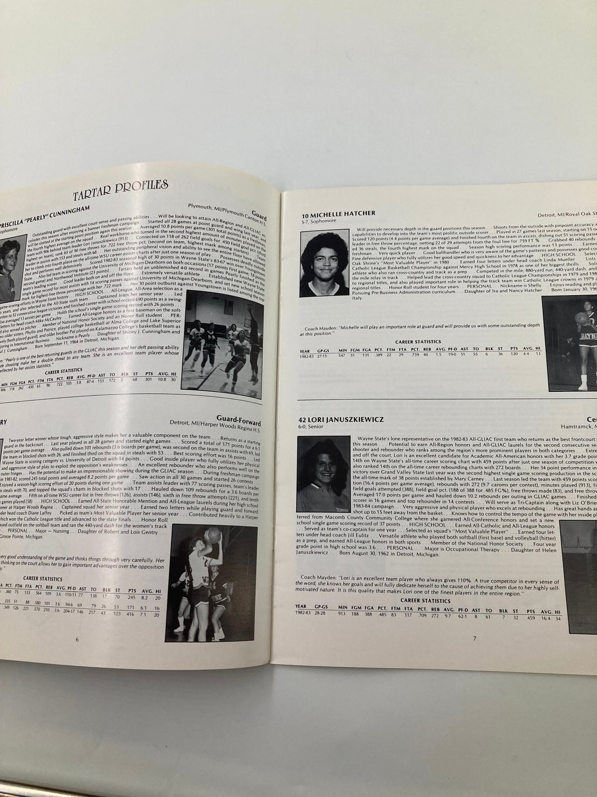 VTG 1983-1984 Wayne State Women's Basketball Program featuring Tartar profiles of players Michelle Ratcher and Lori Januszkiewicz, showcasing their statistics and contributions.