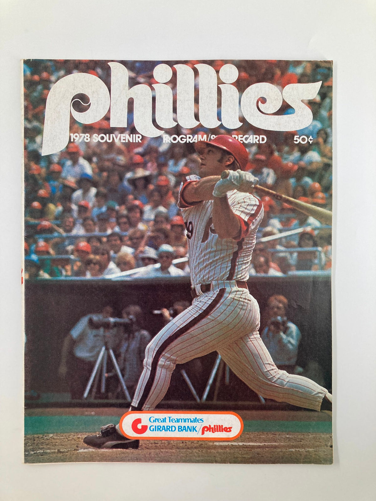 1978 MLB Philadelphia Phillies Souvenir Program/Scorecard cover featuring a player in action at bat, vibrant graphics highlighting the Phillies logo.