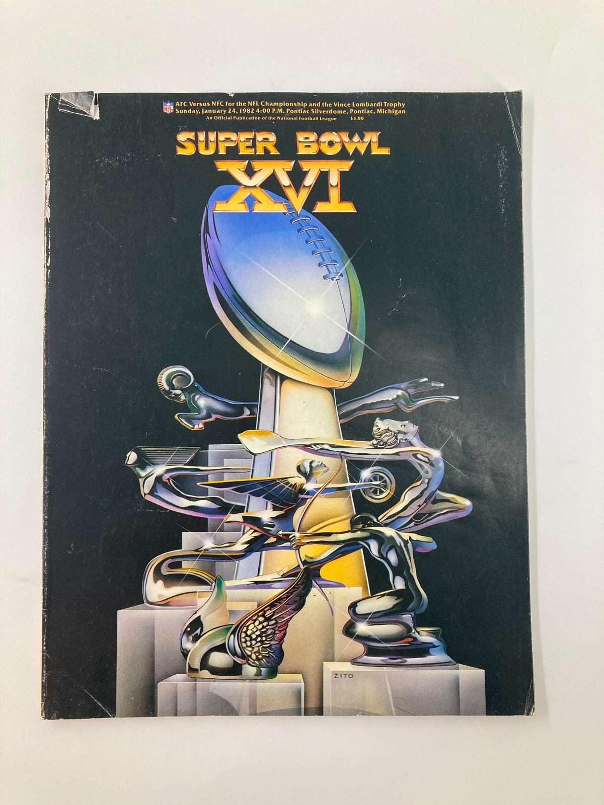 Cover of the January 24, 1982 NFL Superpro Club Super Bowl XVI Magazine featuring the Vince Lombardi Trophy and stylized players.