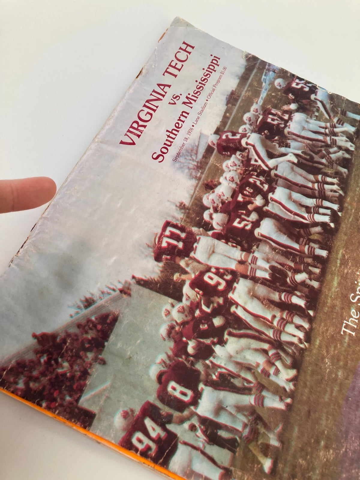 Close-up view of the September 18, 1976 Football program showing Virginia Tech vs Southern Mississippi, highlighting the team lineup.
