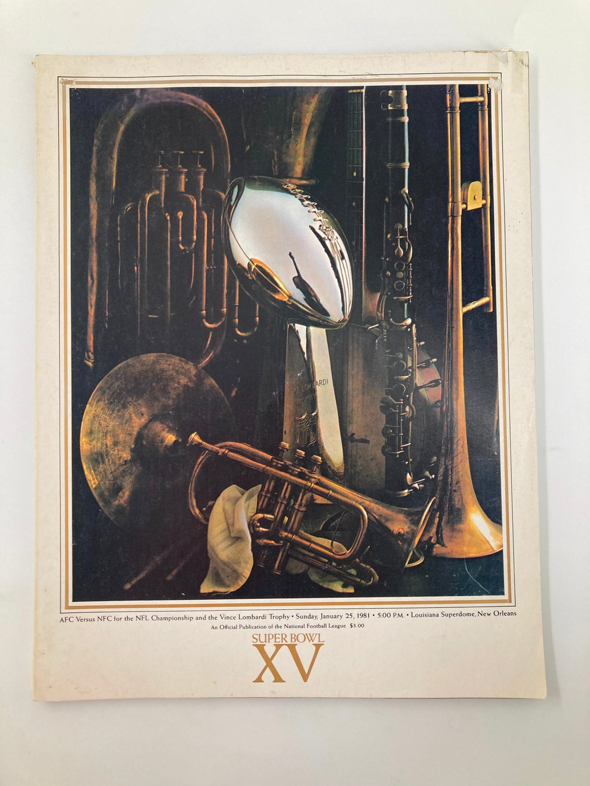 January 25, 1981 NFL AFC vs NFC Super Bowl XV Official Magazine cover featuring the Vince Lombardi Trophy and musical instruments, showcasing a vintage football collectible.