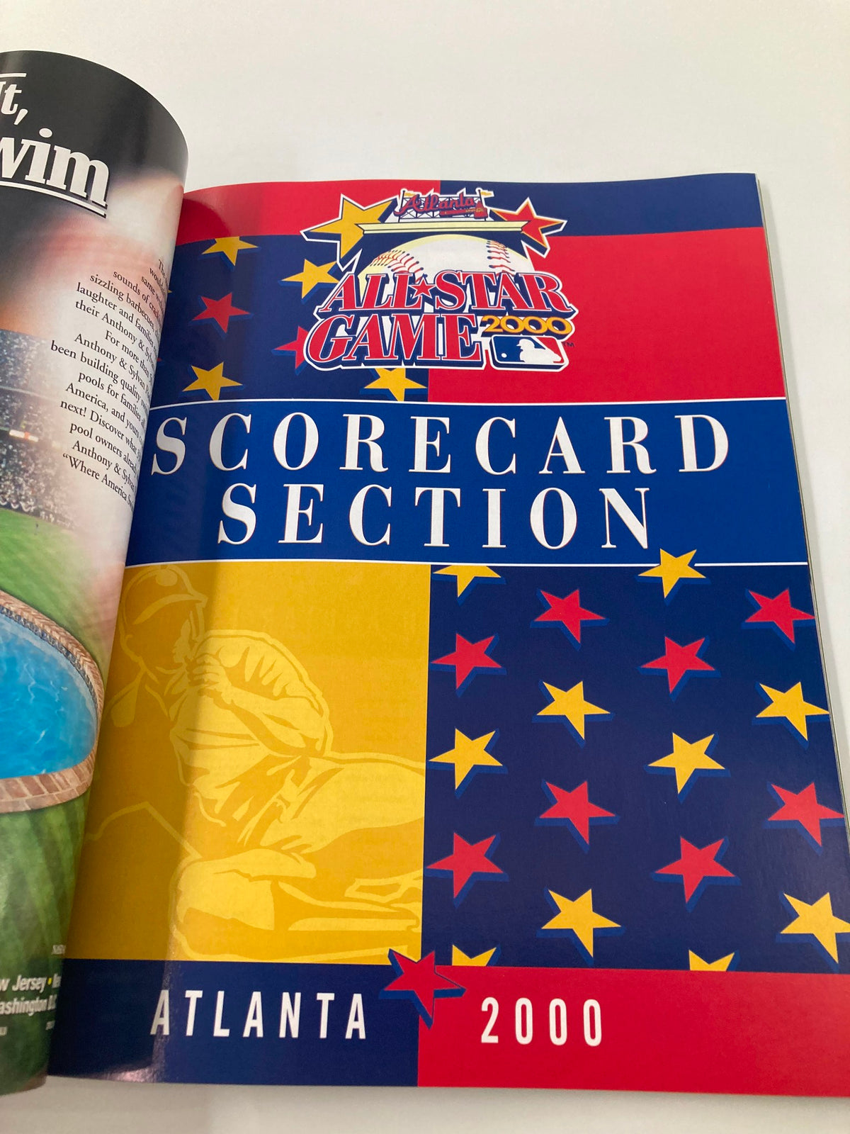 Cover page for the scorecard section of the 2000 Major League Basketball All Star Game Official Program, showcasing a colorful design with stars.