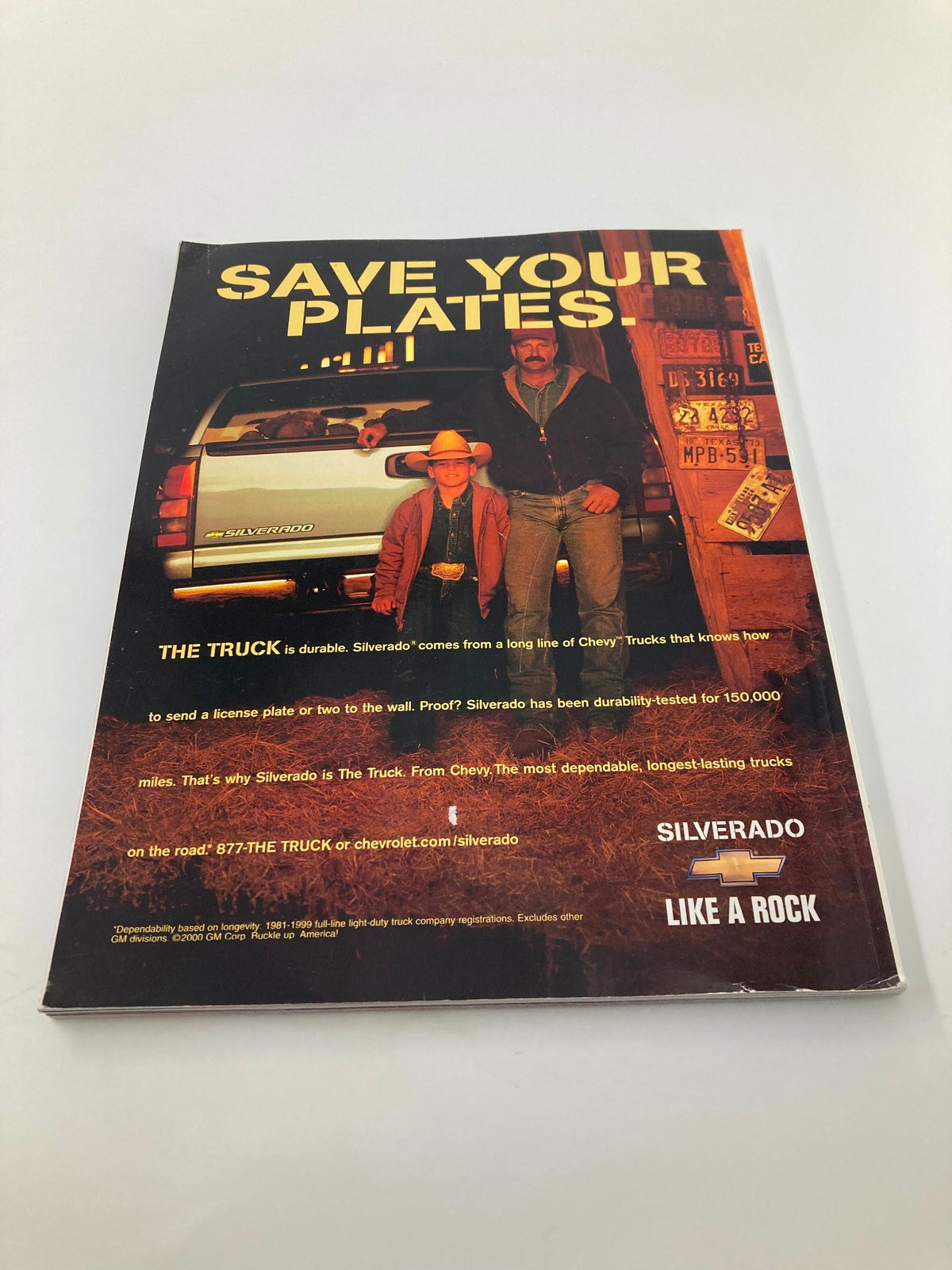 2000 Major League Basketball All Star Game Official Program with an advertisement for Chevrolet Silverado, highlighting the durability of their trucks.