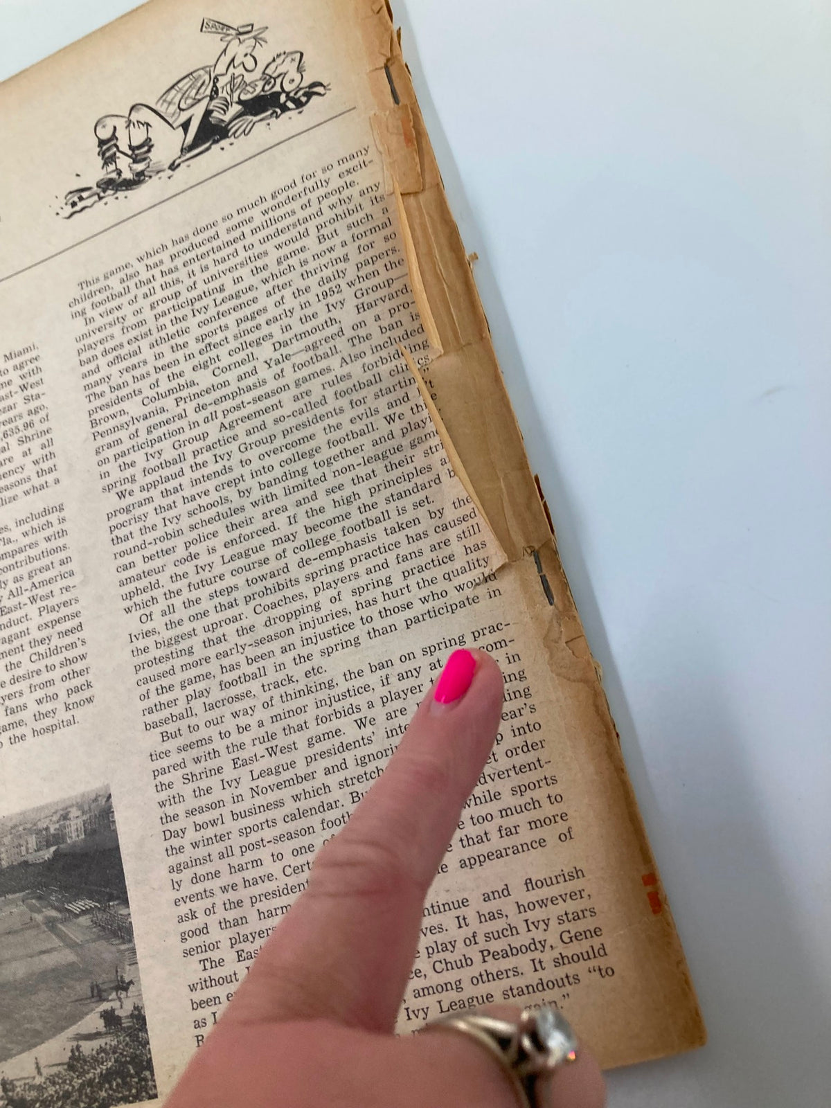 Close-up view of a page in VTG Sport Magazine January 1956 displaying editorial content on sports, including references to the Ivy League and football history.