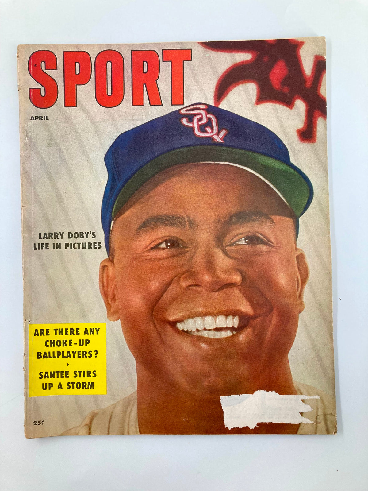 Vintage Sports Magazine April 1956 featuring Larry Doby on the cover, highlighting his life in pictures and discussing sports controversies.
