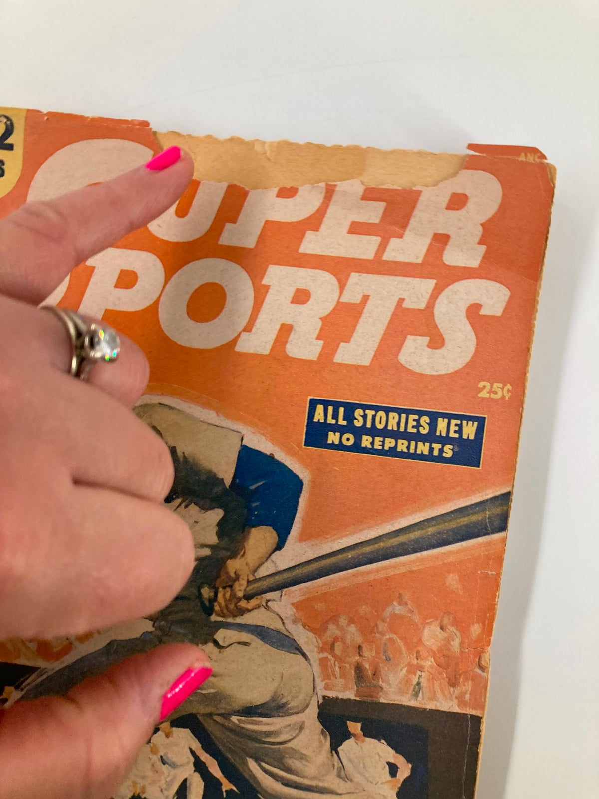 Close-up of 'Super Sports' magazine cover from September 1951 titled 'Shadow Over The Dugout,' highlighting wear on the top edge and vibrant orange color.
