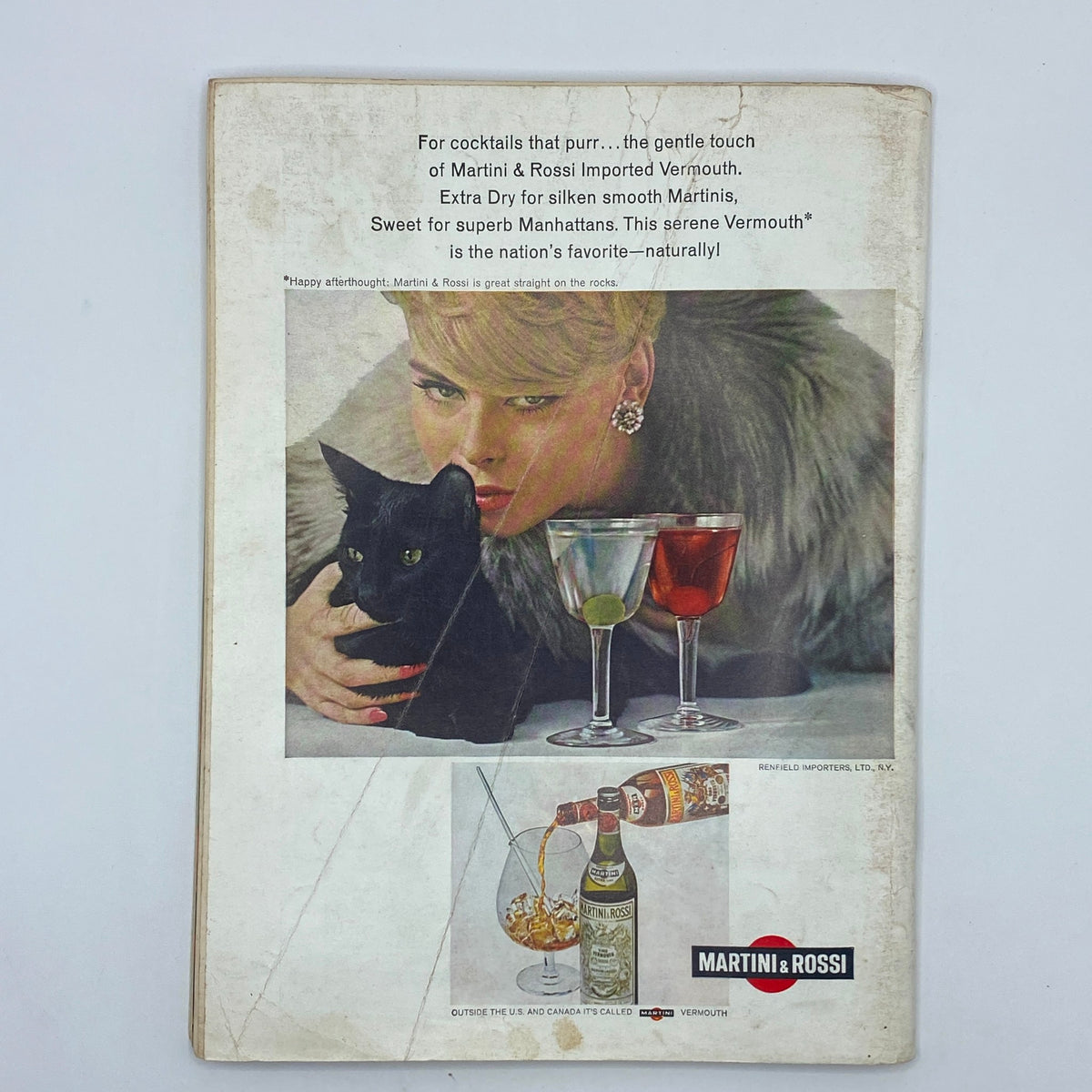 Back cover of the VTG Playboy Magazine June 1966, showcasing an advertisement for Martini & Rossi Vermouth, featuring a glamorous woman with a black cat.