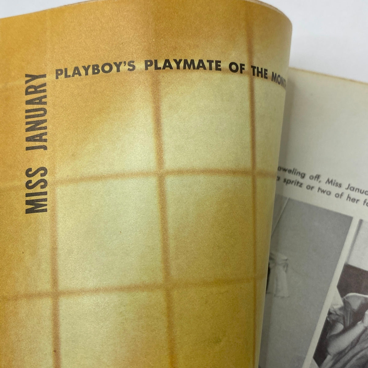 Centerfold page of Playboy Magazine January 1961 highlighting Connie Cooper as Playmate of the Month, reflecting the magazine's nostalgic charm.