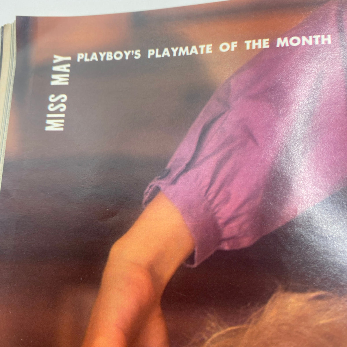 Inside page of VTG Playboy Magazine May 1982 highlighting 'Miss May' as Playboy's Playmate of the Month, featuring an elegantly dressed arm.