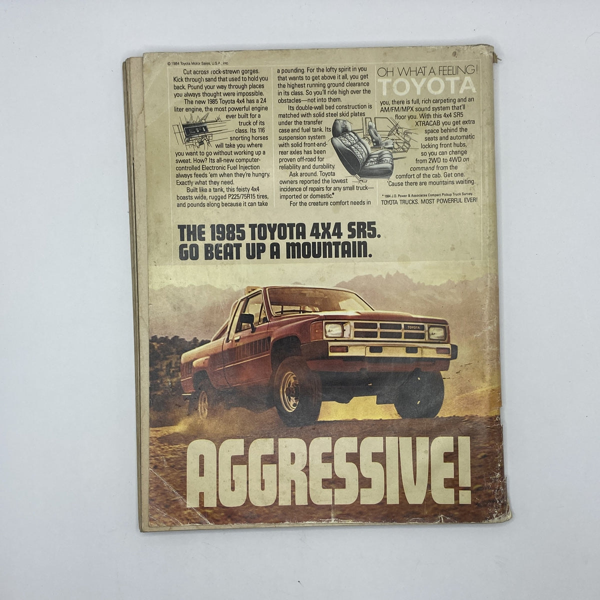 Back cover of VTG Playboy Magazine May 1985 highlighting an advertisement for the 1985 Toyota 4x4 SR5, emphasizing its rugged capabilities.