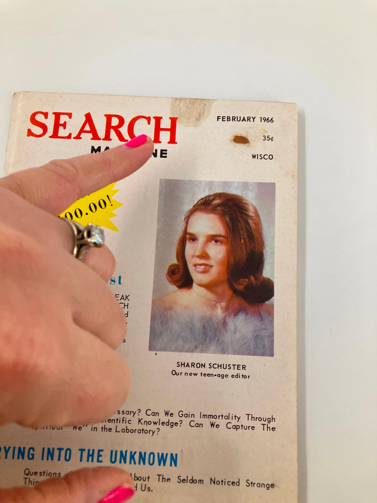 Close-up view of the front cover of VTG Search Magazine February 1966, issue #67, highlighting Sharon Schuster as Teen-Age Editor with a finger pointing to the title. The cover displays a nostalgic 1960s aesthetic.