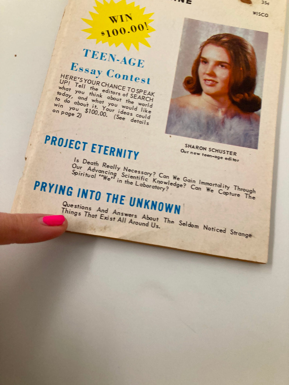 Detailed view of the front cover of VTG Search Magazine February 1966, issue #67. Showcases a prompt for a Teen-Age Essay Contest and vivid colors typical of the mid-60s magazine style.