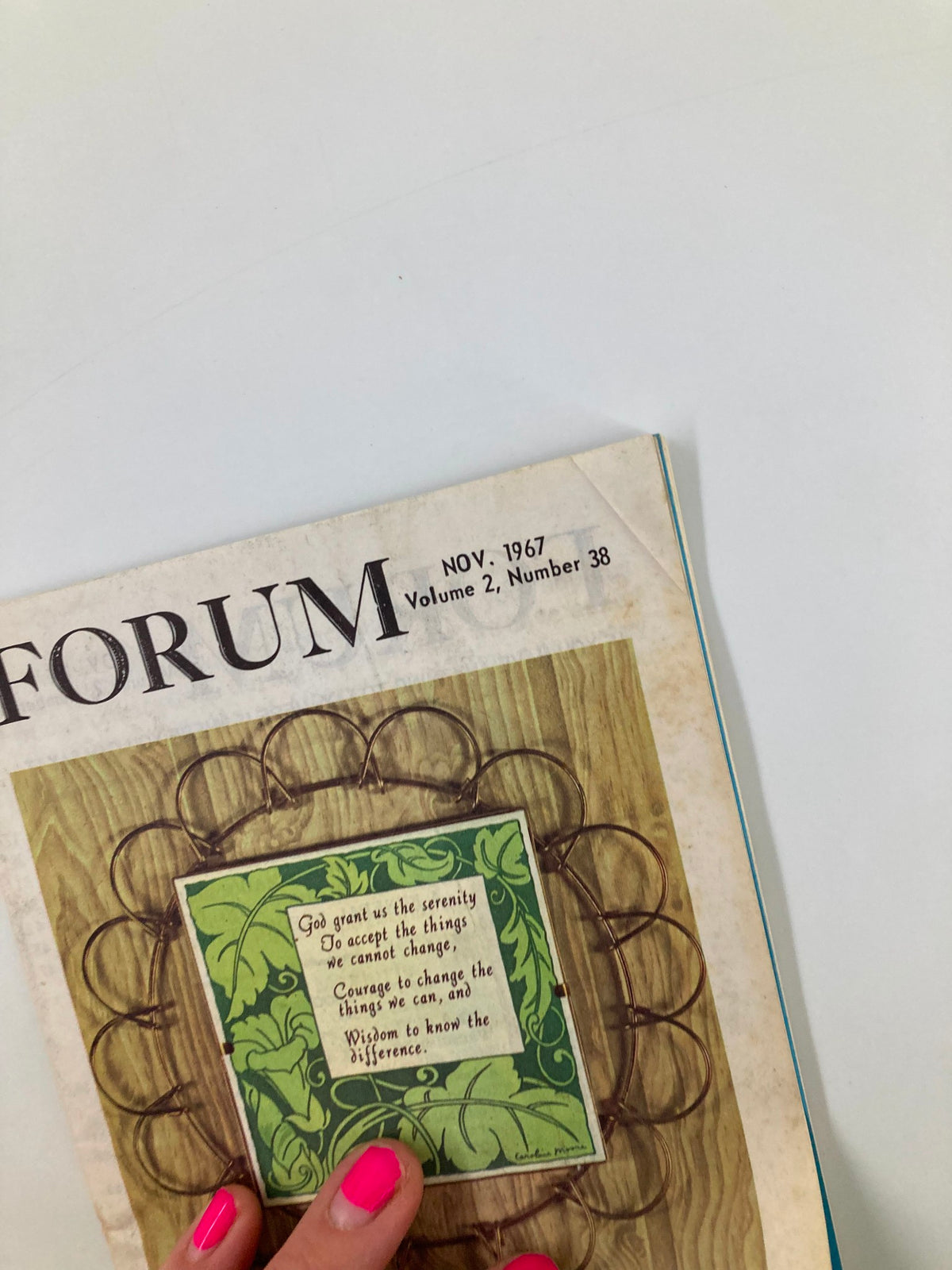 Another perspective of the VTG Forum Magazine November 1967 Vol 2 #38 being held, emphasizing its vintage design and the featured quote.