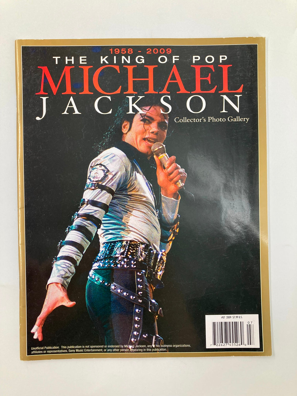 The King of Pop Michael Jackson 1958-2009 Collector's Photo Gallery #07 featuring a close-up of Michael Jackson in a stunning outfit, capturing his signature stage presence in this collector's edition.