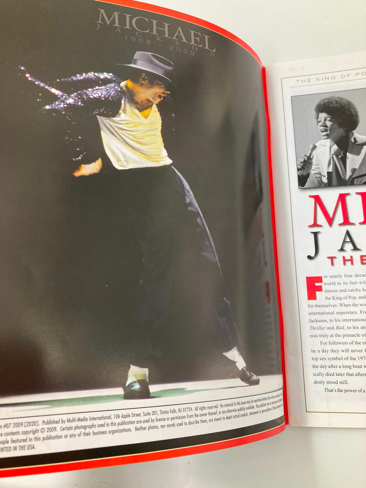 Michael Jackson performing with iconic style in the Michael Jackson 1958-2009 Collector's Photo Gallery #07, showcasing his legendary dance moves.