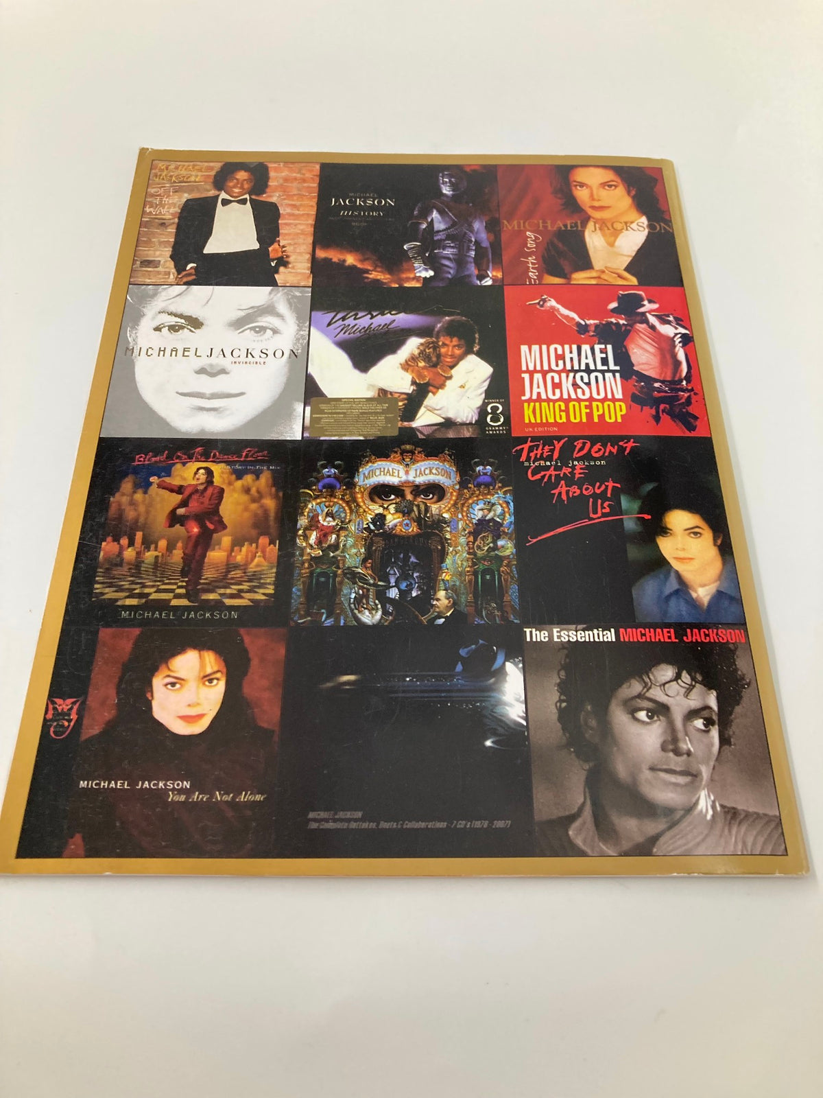 Michael Jackson Collector's Photo Gallery #07 featuring a collage of Michael Jackson's album covers, celebrating his legacy and musical contributions.
