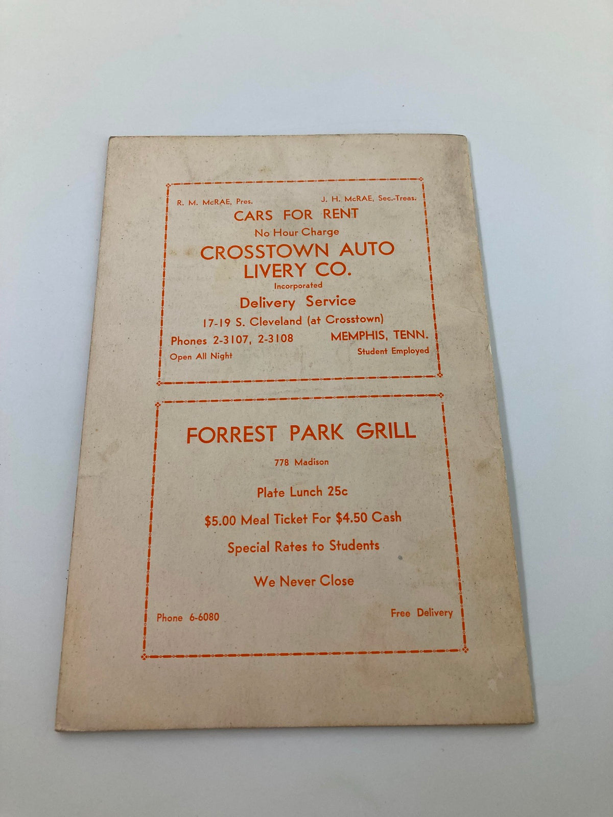 Back cover of the 1932-1933 University of Tennessee Memphis Directory featuring advertisements for transportation and dining options.
