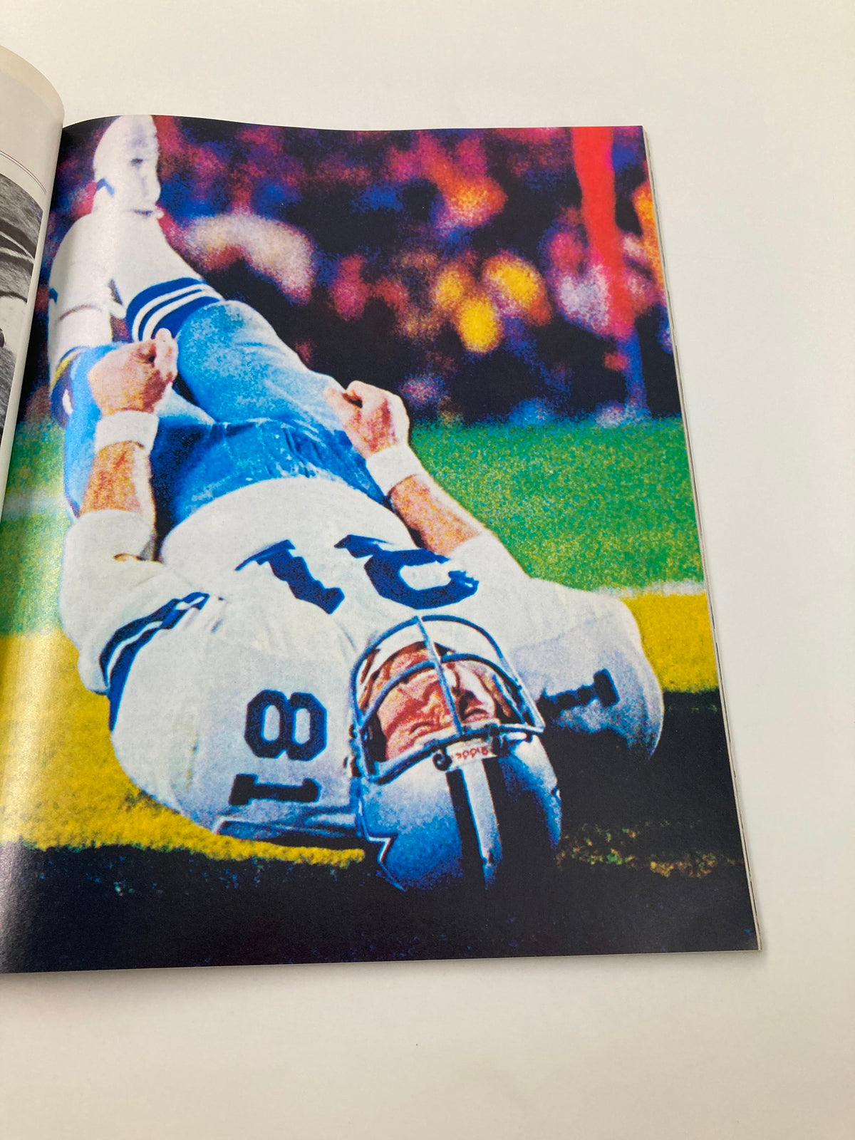 January 24 1982 AFC vs NFC NFL Championship Super Bowl XVI Official Program displaying a player from the Dallas Cowboys on the field, capturing a moment of the game.