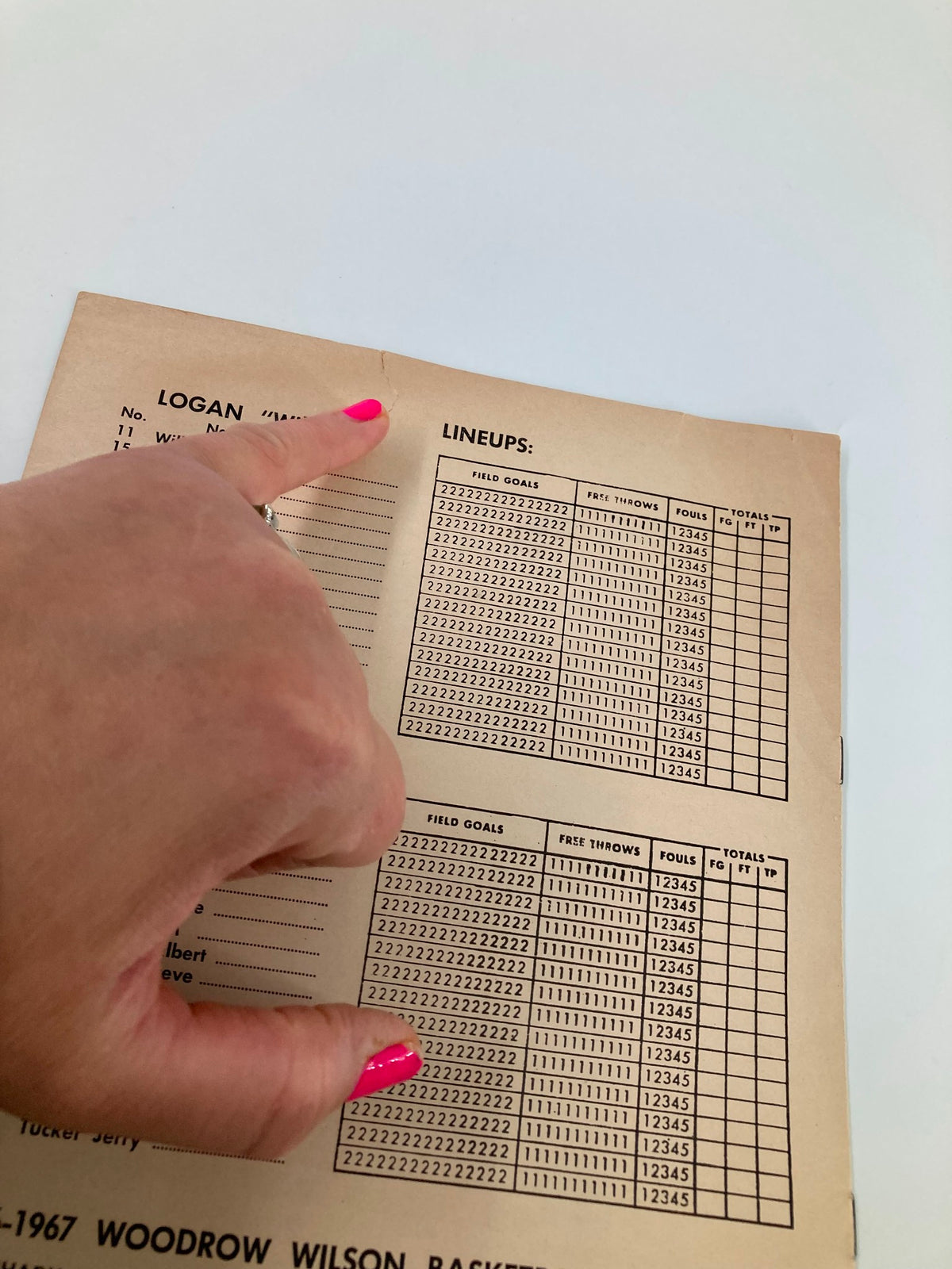 Image of the interior of the February 21, 1967 Beckley Flying Eagles vs Logan Wildcats Basketball Program, showcasing lineups and scoring details.