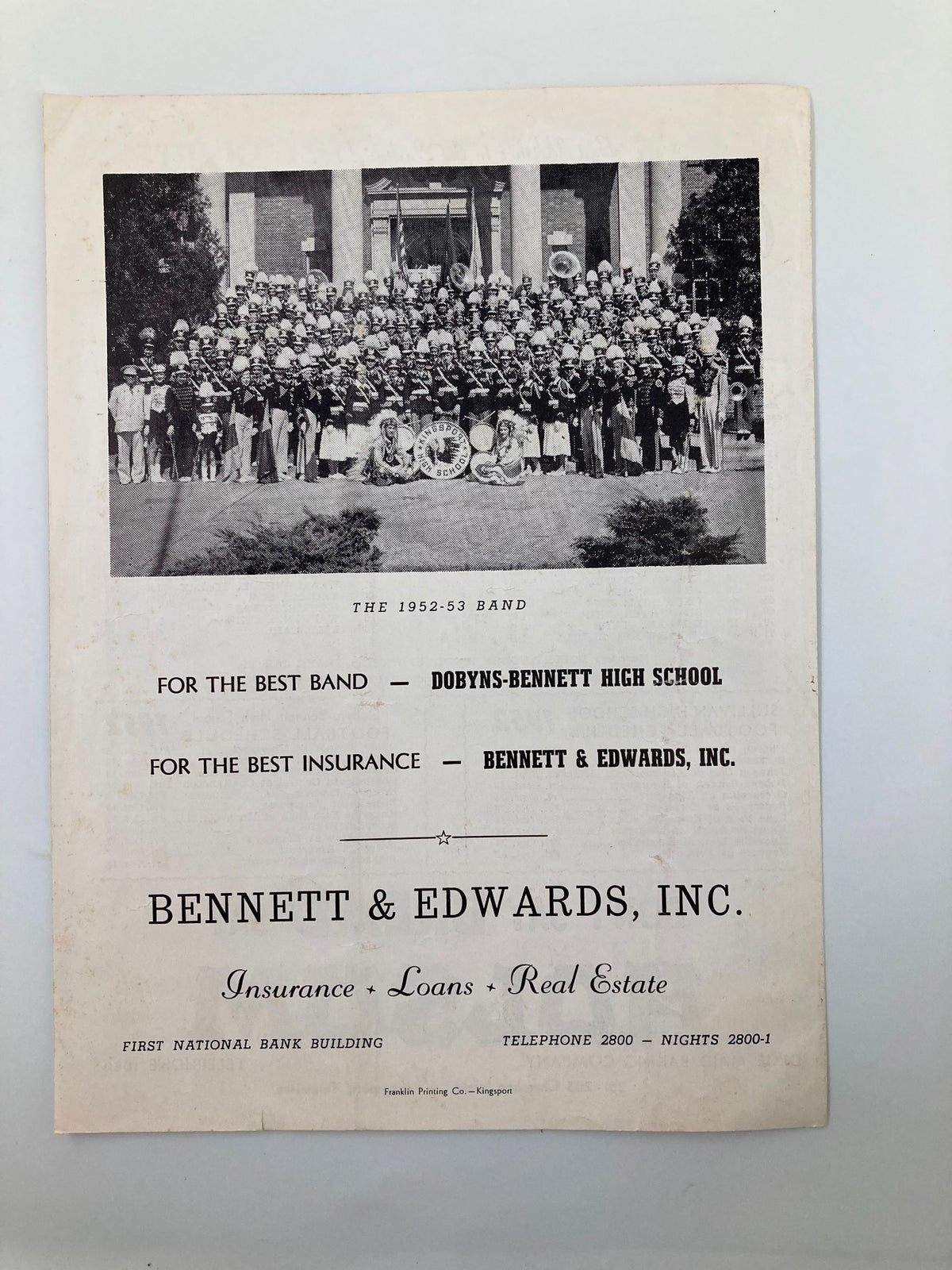 Back cover of the Official Program for the November 7, 1952 Football game between Kingsport and Young High, featuring a photograph of the 1952-53 band.