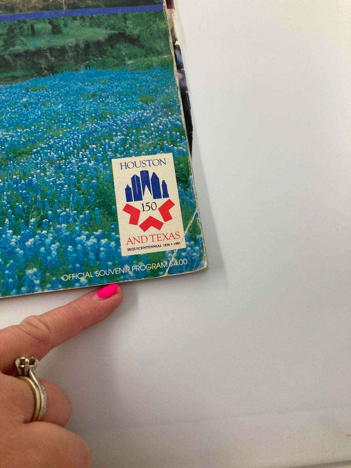 Close-up of the logo and text on the VTG December 31 1985 Air Force vs Texas Bluebonnet Bowl Official Program highlighting Houston's 150th anniversary.
