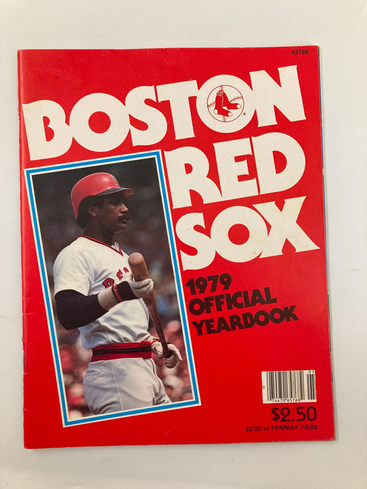 Cover of the 1979 MLB Boston Red Sox Official Yearbook featuring player profile of a Red Sox batter, vibrant red background, and iconic Boston Red Sox logo.