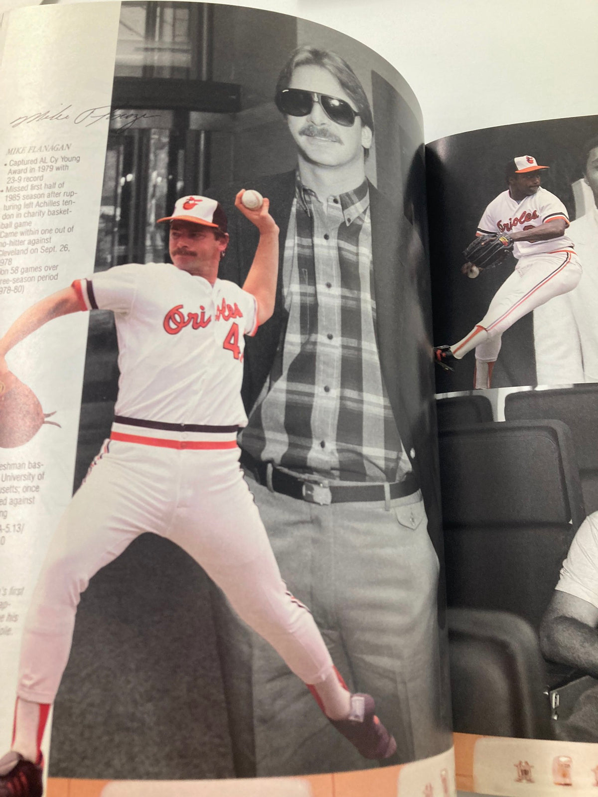 Image from the 1966 Baltimore Orioles Yearbook featuring Mike Flanagan in an Orioles uniform, highlighting player statistics and nostalgic baseball imagery.