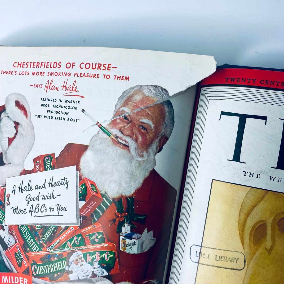 Advertisement featuring Santa Claus promoting Chesterfield cigarettes, alongside the Time Magazine issue from December 1, 1947, showcasing historical advertising from the Time Magazine Library Bound Weekly.