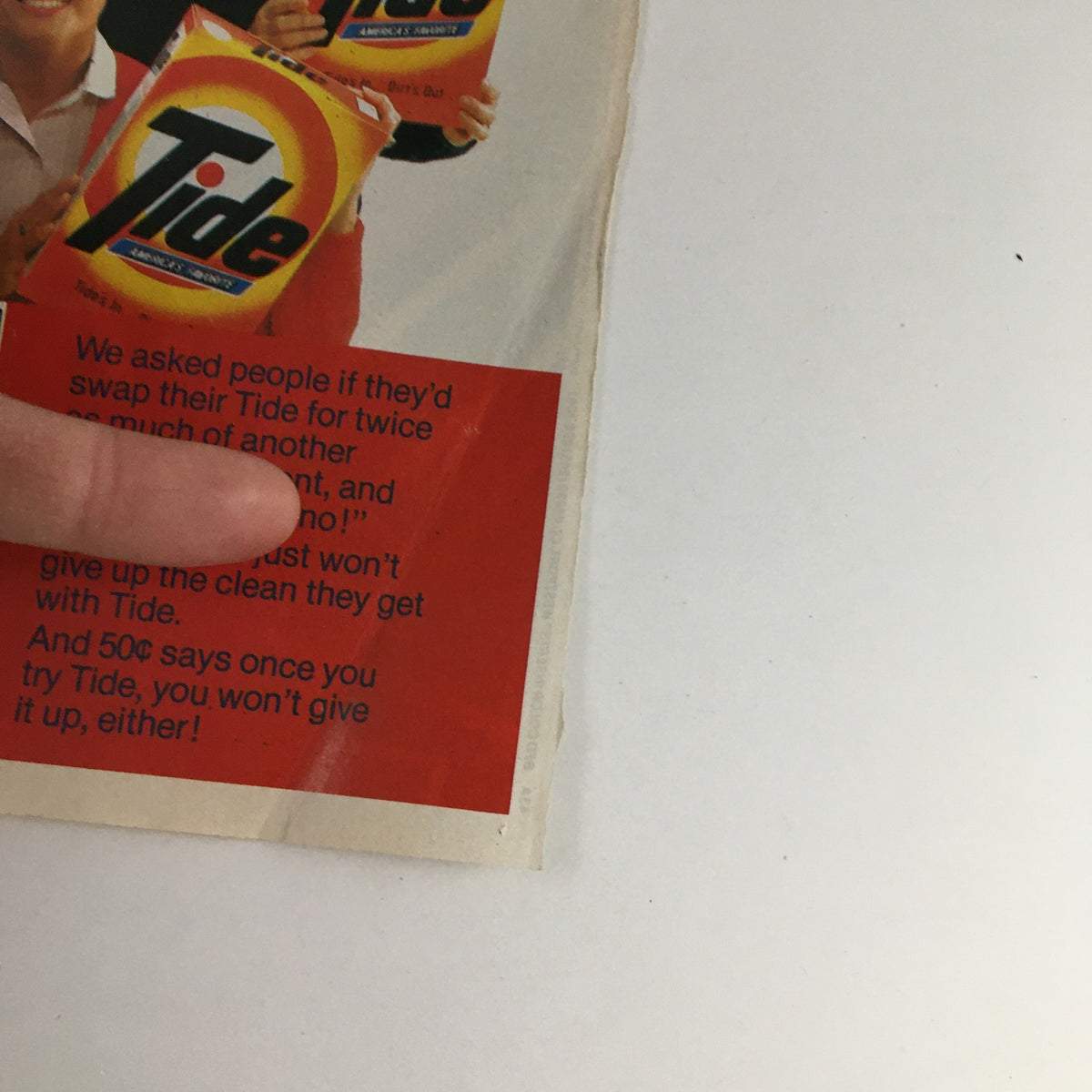 1983 Tide Detergent Linda Fratianne Olympic Circular Coupon Advertisement showing people holding Tide detergent boxes and a promotional message about the product's effectiveness.
