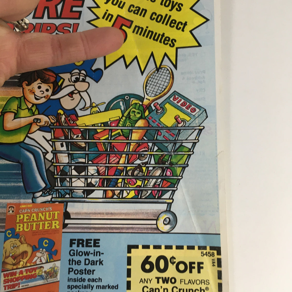 1983 Quaker Oats Cap'N Crunch Cereal Circular Coupon Advertisement showcasing a fun shopping scene with kids and Cap'n Crunch, highlighting toys that can be collected in 5 minutes.