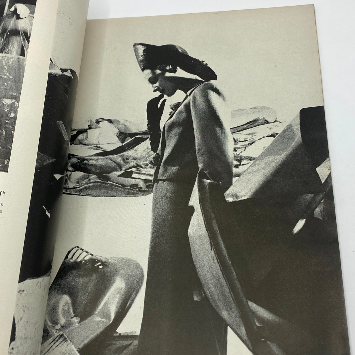 VTG Vogue Magazine April 1 1963 displaying a striking black and white image of a model in avant-garde fashion, embodying the dramatic style of the 1960s era.