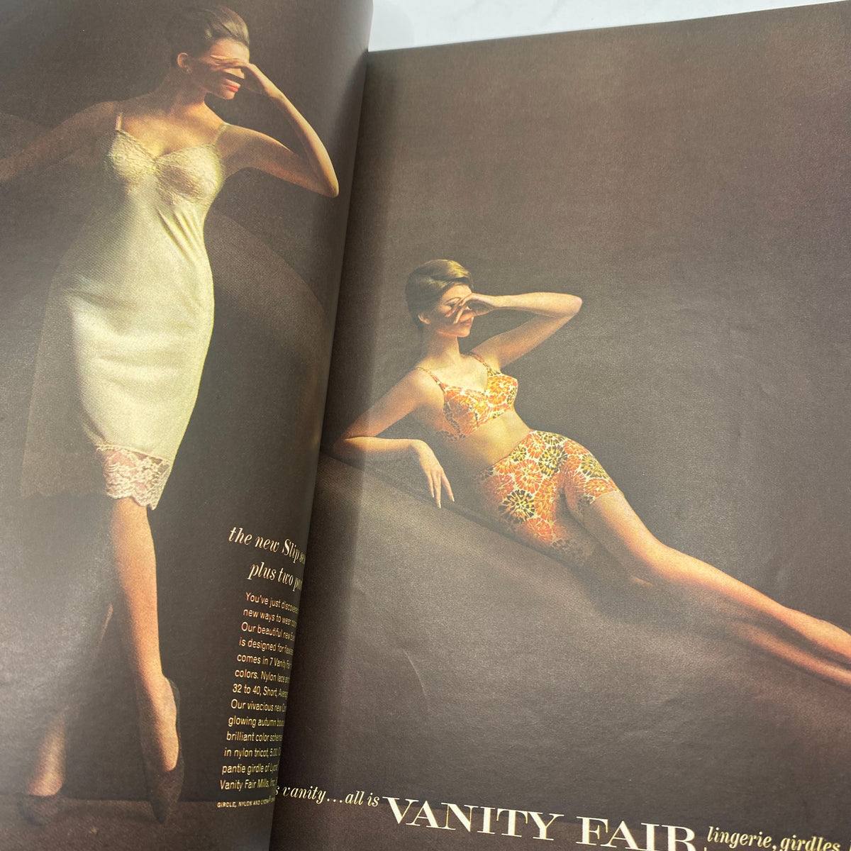 Lingerie advertisement in VTG Vogue Magazine September 15, 1963 featuring Vanity Fair products. The page displays two models in stylish lingerie sets, highlighting the era's fashion trends.