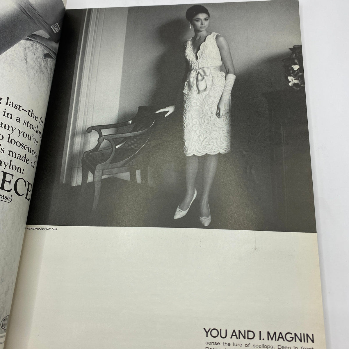 Elegant fashion photograph from the VTG Vogue Magazine April 1 1965, displaying a model in a stylish white dress.