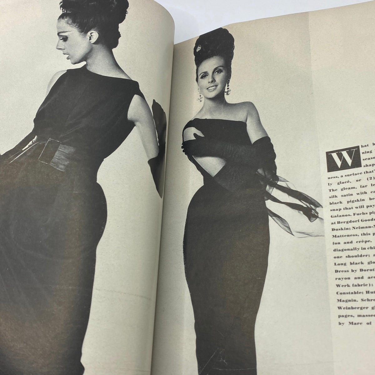 Two models in sophisticated black dresses featured in VTG Vogue Magazine September 15 1962, exemplifying the classic evening wear style and glamour of the 1960s.