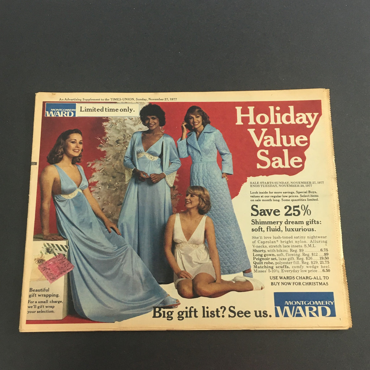 VTG November 27 1977 Montgomery Ward Holiday Value Sale Circular featuring women modeling sleepwear with a festive background, promoting gift ideas.