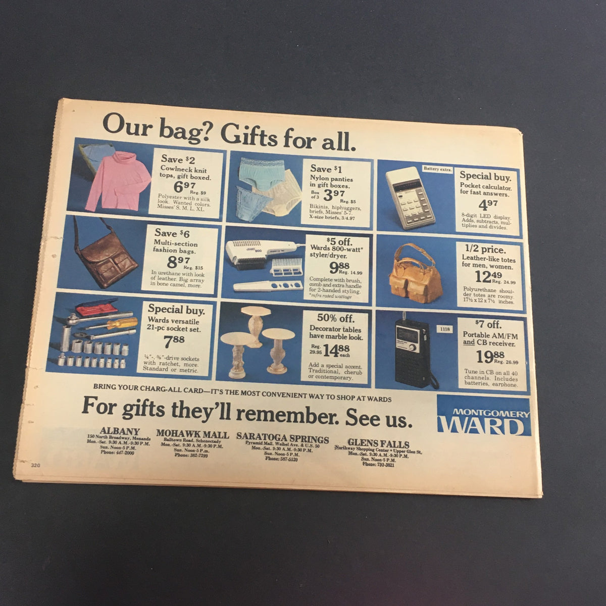 VTG November 27 1977 Montgomery Ward Holiday Value Sale Circular presenting a collection of gift items including clothing, accessories, and electronics, with savings listed.
