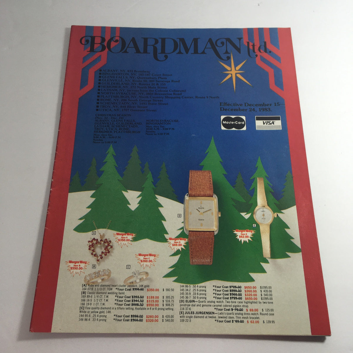 VTG December 1983 Boardman Ltd. International Silver Co. Price Guide Catalog cover featuring a colorful design with Christmas trees and jewelry advertisements.