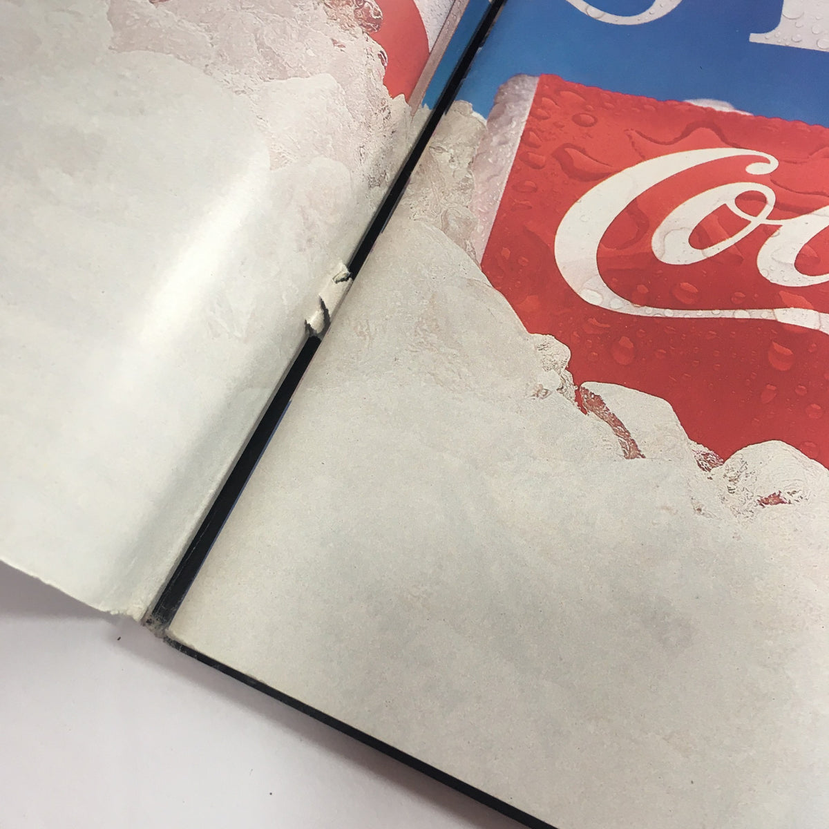 Interior page of VTG USFL Kickoff Official Magazine 1984 Vol. 2 #7, featuring a Coca-Cola advertisement with ice and condensation effects.