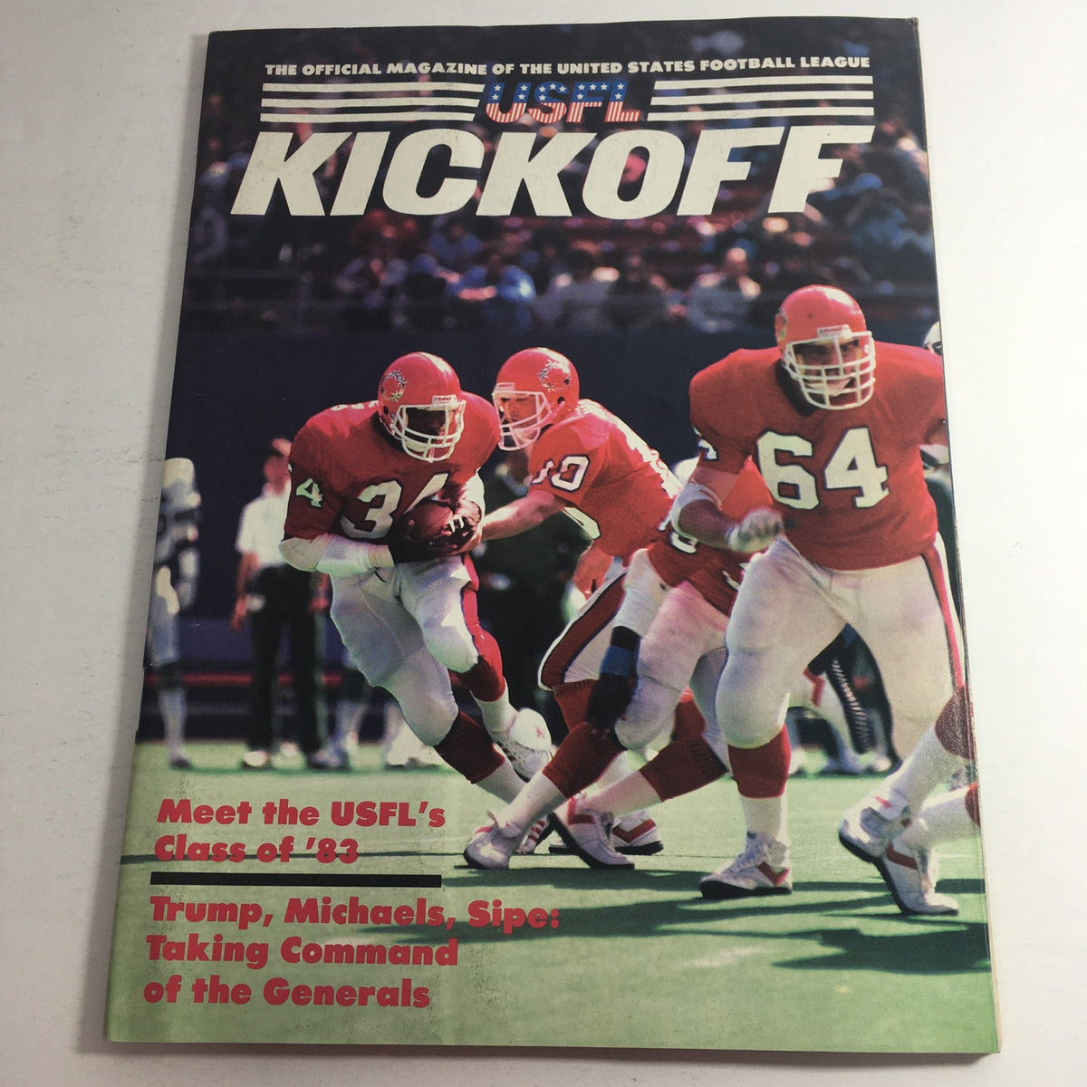 Cover of the USFL Kickoff Official Magazine 1984 Vol. 2 #2 showcasing a dynamic football scene with players in red uniforms, featuring the headline 'Meet the USFL’s Class of ’83'.